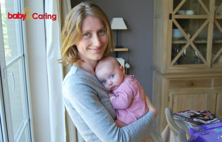 How to hold a newborn baby